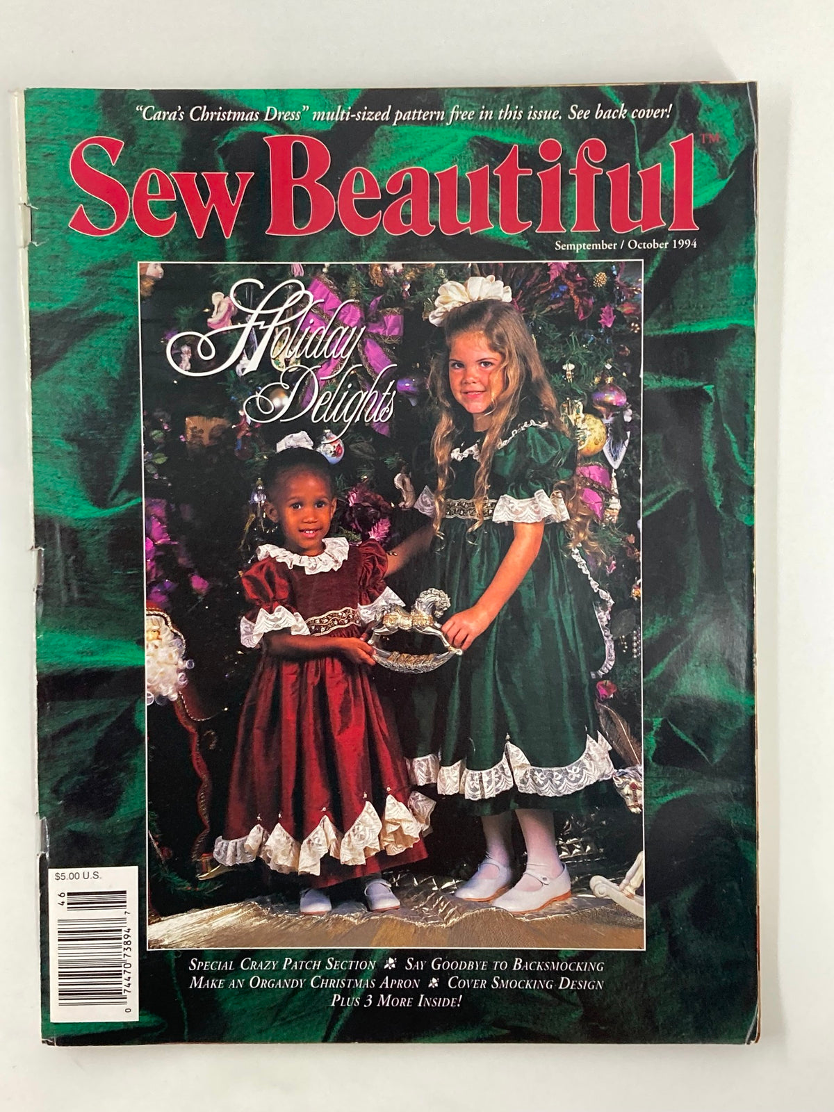 Cover of Sew Beautiful Magazine September 1994 featuring Cara's Holiday Dress, showcasing two children in festive holiday attire.