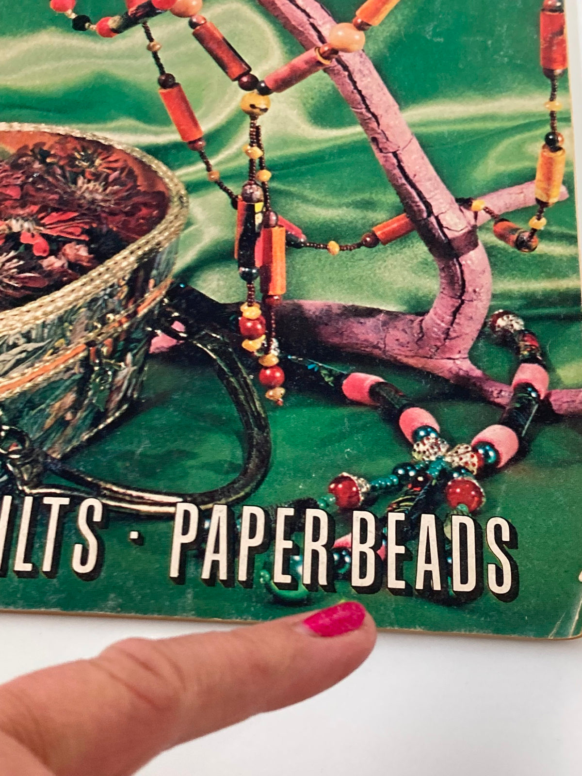 Close-up detail of VTG Creative Crafts Magazine October 1972 focusing on paper bead projects.