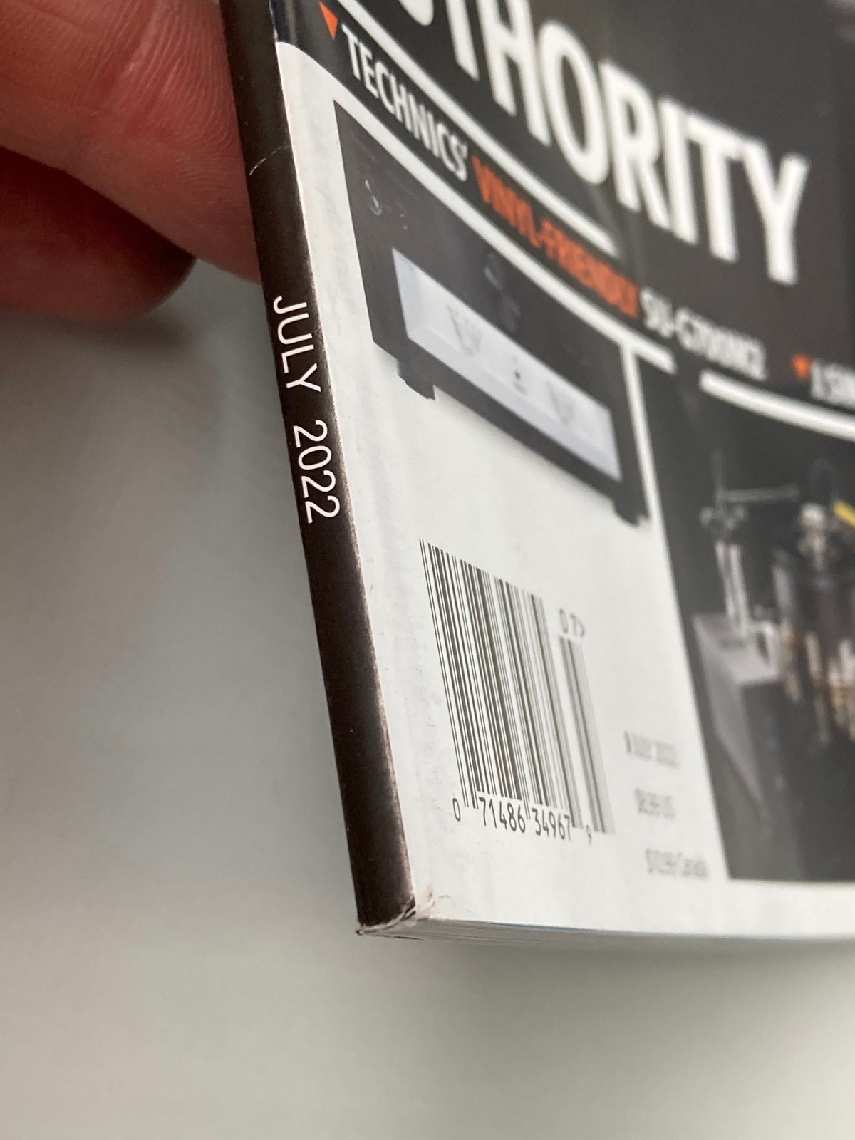 Close-up of the spine of Stereophile Magazine July 2022 edition, highlighting the publication date and emphasizing its vintage appeal.