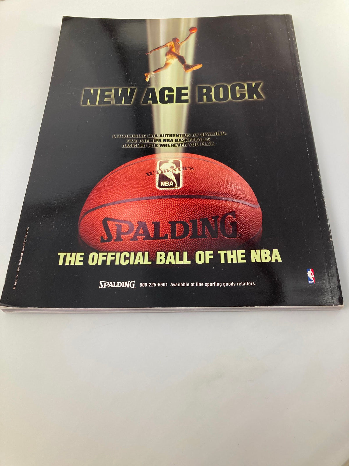 Cover of the NBA Chicago Bulls Official 1997 - 1998 Yearbook featuring Michael Jordan, showcasing a vintage magazine design with a basketball and team logo elements.