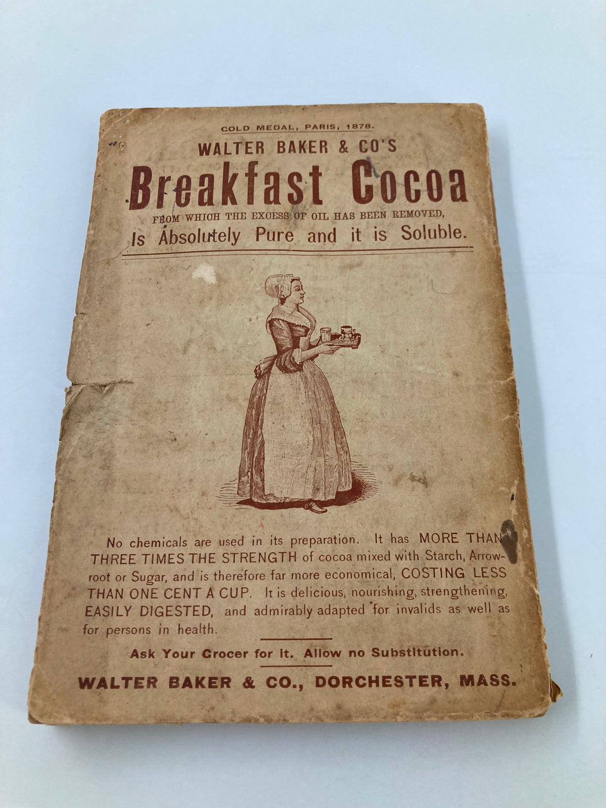 The Red-Letter Series No. III The Merry Men and Other Tales and Fables - An image of a vintage advertisement for Walter Baker & Co.'s Breakfast Cocoa, connected to the book's context.