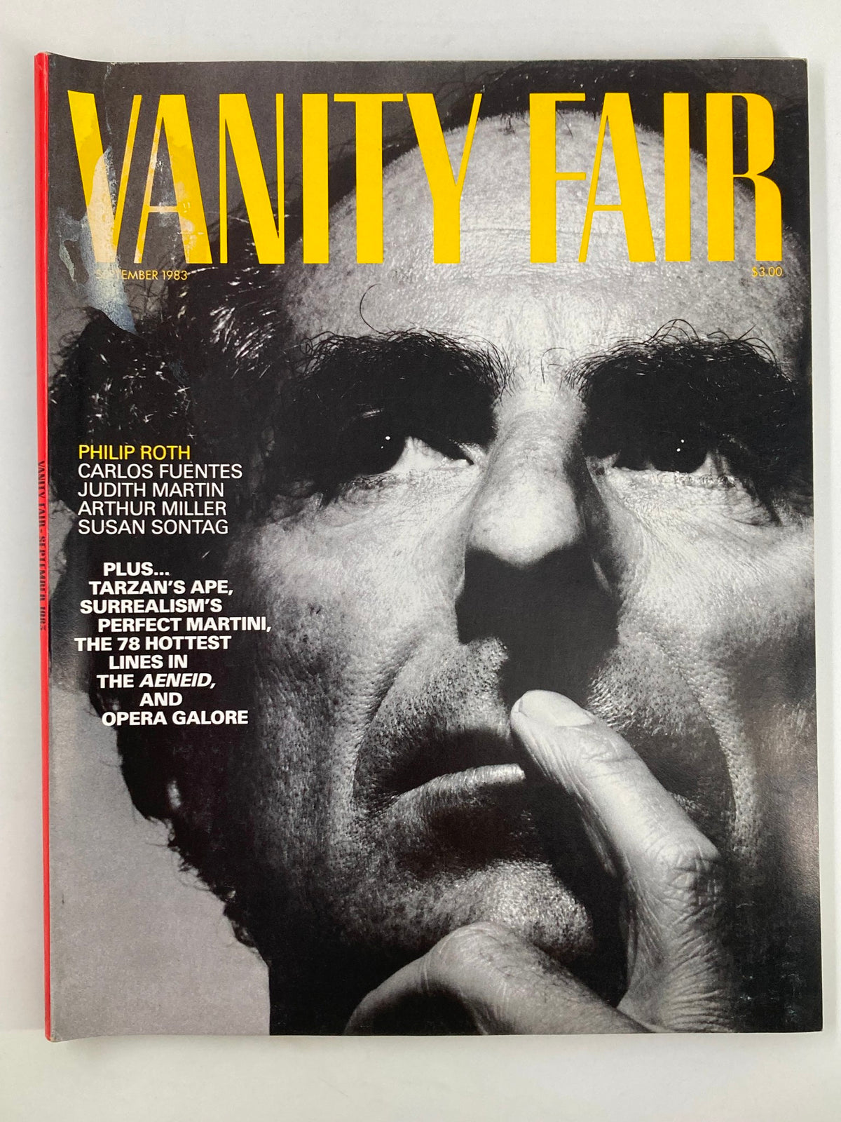 Cover of the September 1983 issue of Vanity Fair magazine featuring the title in bold yellow letters. It highlights literary figures Philip Roth, Carlos Fuentes, and others with an artistic black and white close-up photograph of a man's face, adding to the vintage appeal of this collectible magazine.