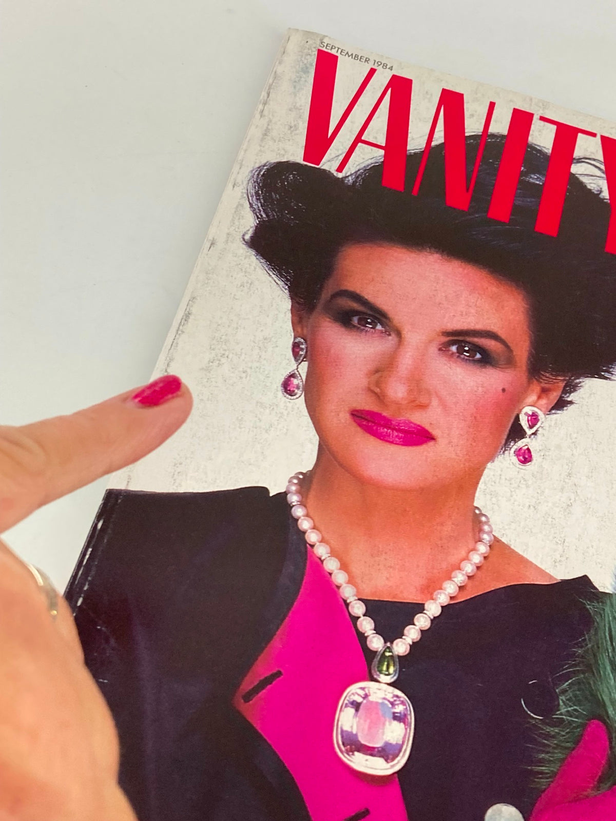 Cover of VTG Vanity Fair Magazine September 1984 showcasing a model with elegant jewelry and dramatic makeup, reflecting the fashion trends of the 1980s.