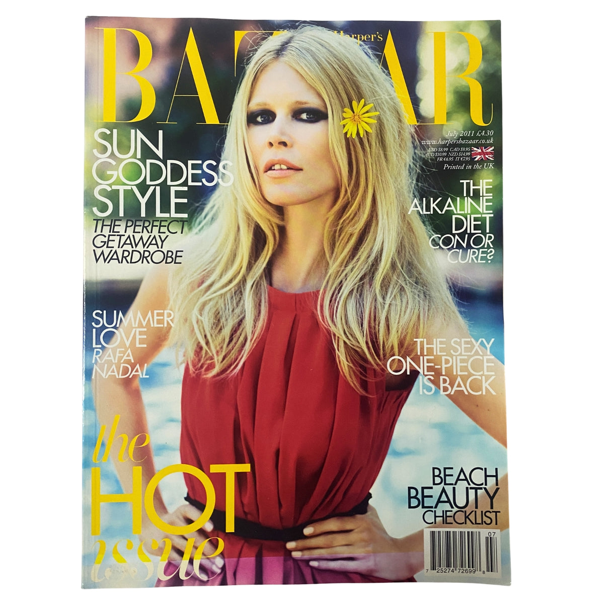 Cover of Harper's Bazaar UK Magazine July 2011 featuring supermodel Claudia Schiffer, embodying the summer style of the early 2010s with bold typography.