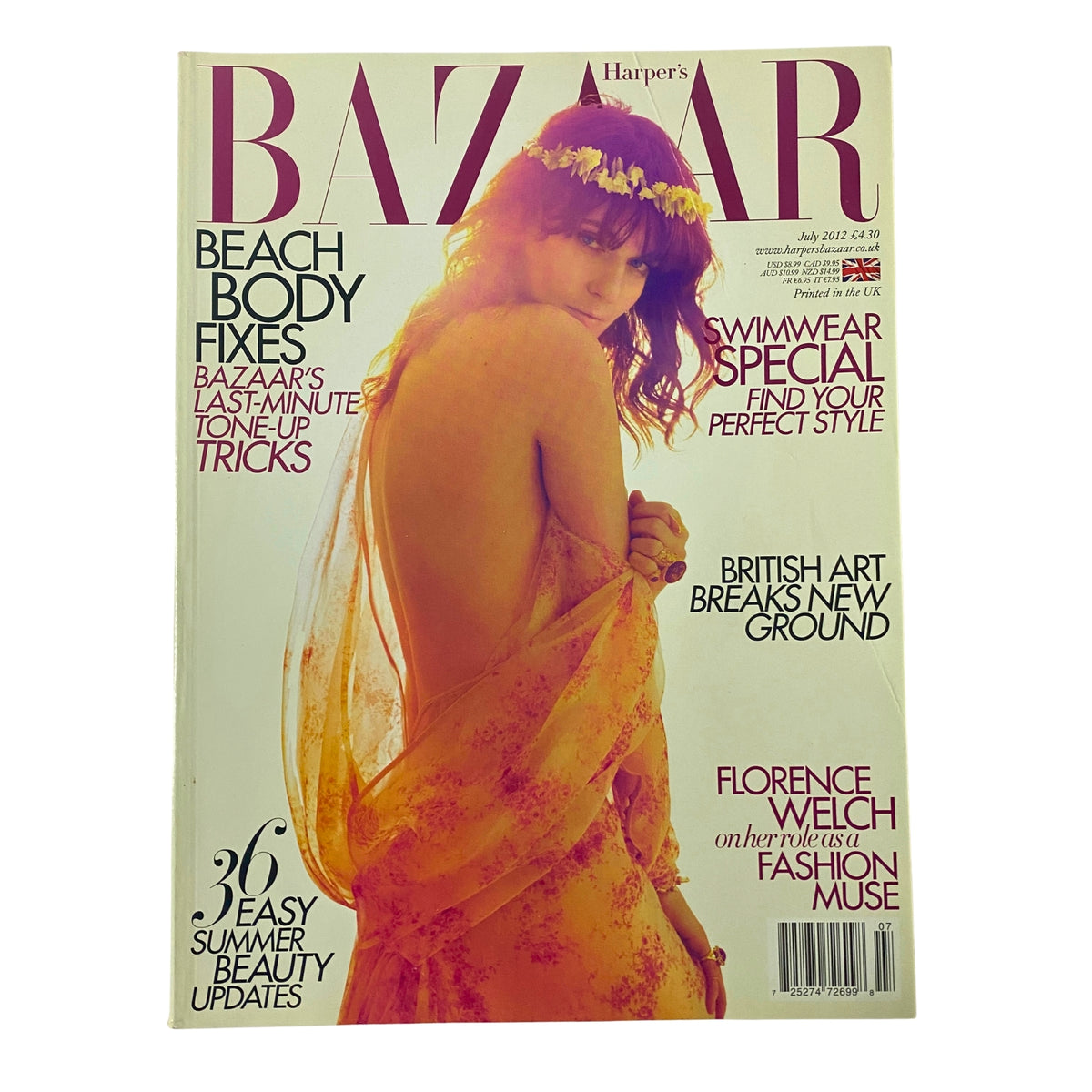 Harper's Bazaar UK Magazine July 2012 featuring Florence Welch on the cover styled in vibrant colors, showcasing summer fashion trends and beauty tips.