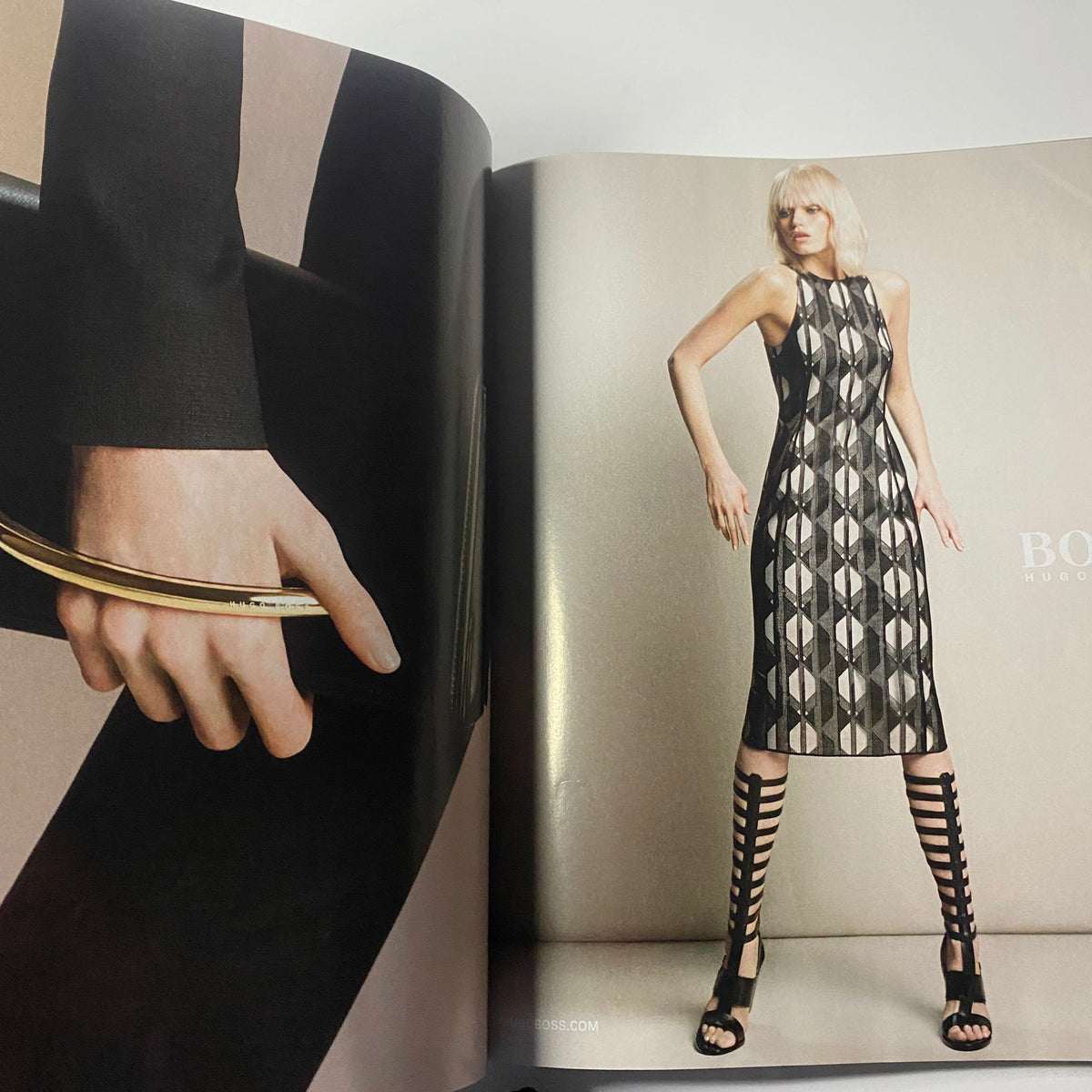 Harper's Bazaar Magazine March 2015 showcasing a bold BOSS advertisement, featuring a model in a geometric patterned dress with striking strappy heels.