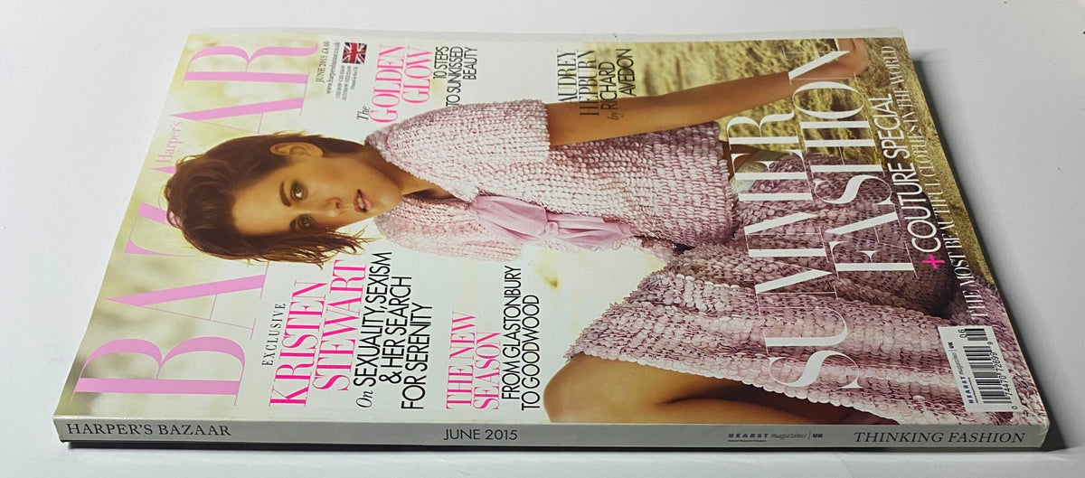 Harper's Bazaar UK Magazine June 2015 featuring Kristen Stewart on the cover in a stylish pink outfit, highlighting themes of identity and femininity.
