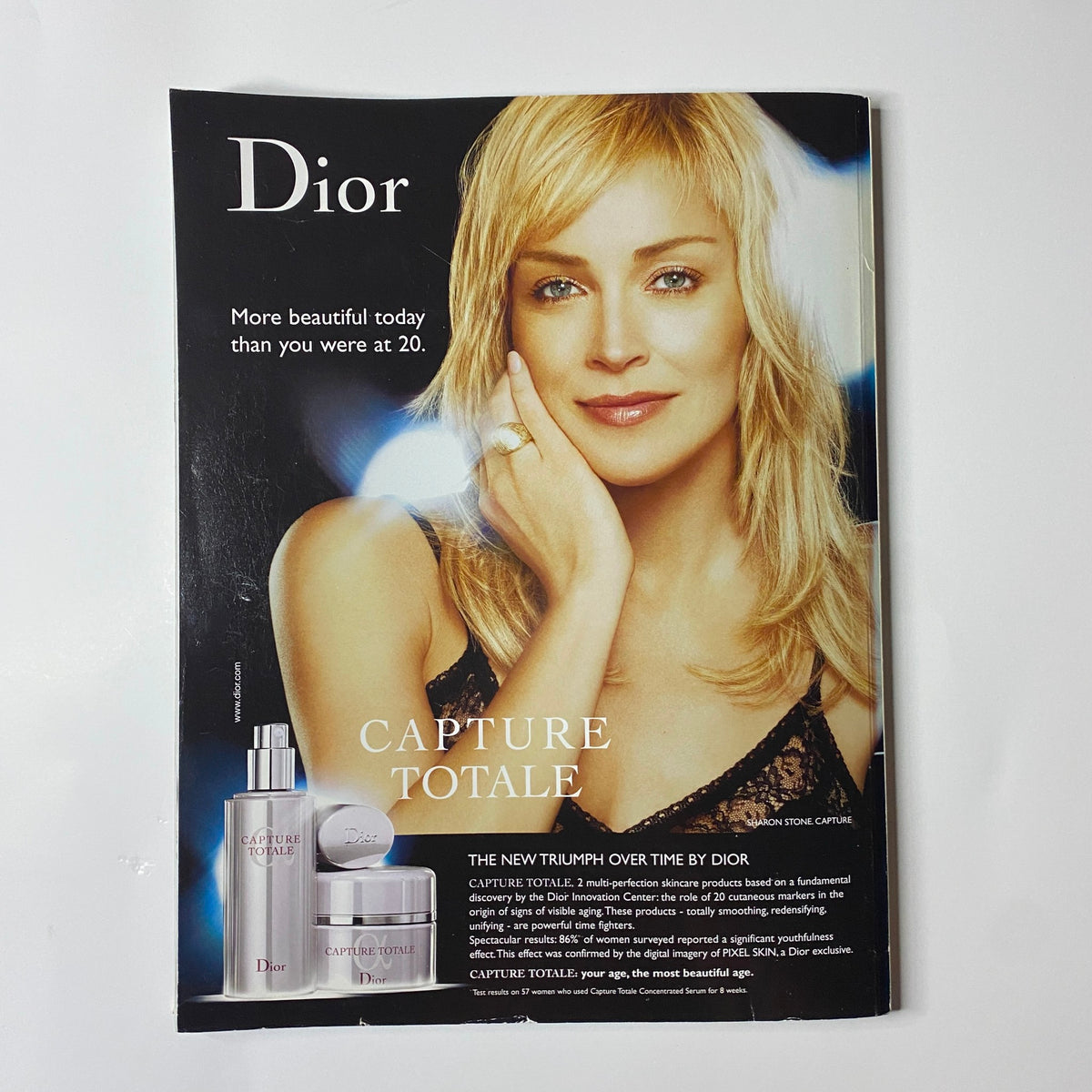 Dior Capture Totale advertisement featuring a blonde woman promoting skincare, from Harper's Bazaar Australia December 2006 issue with Kirsten Dunst on the cover.