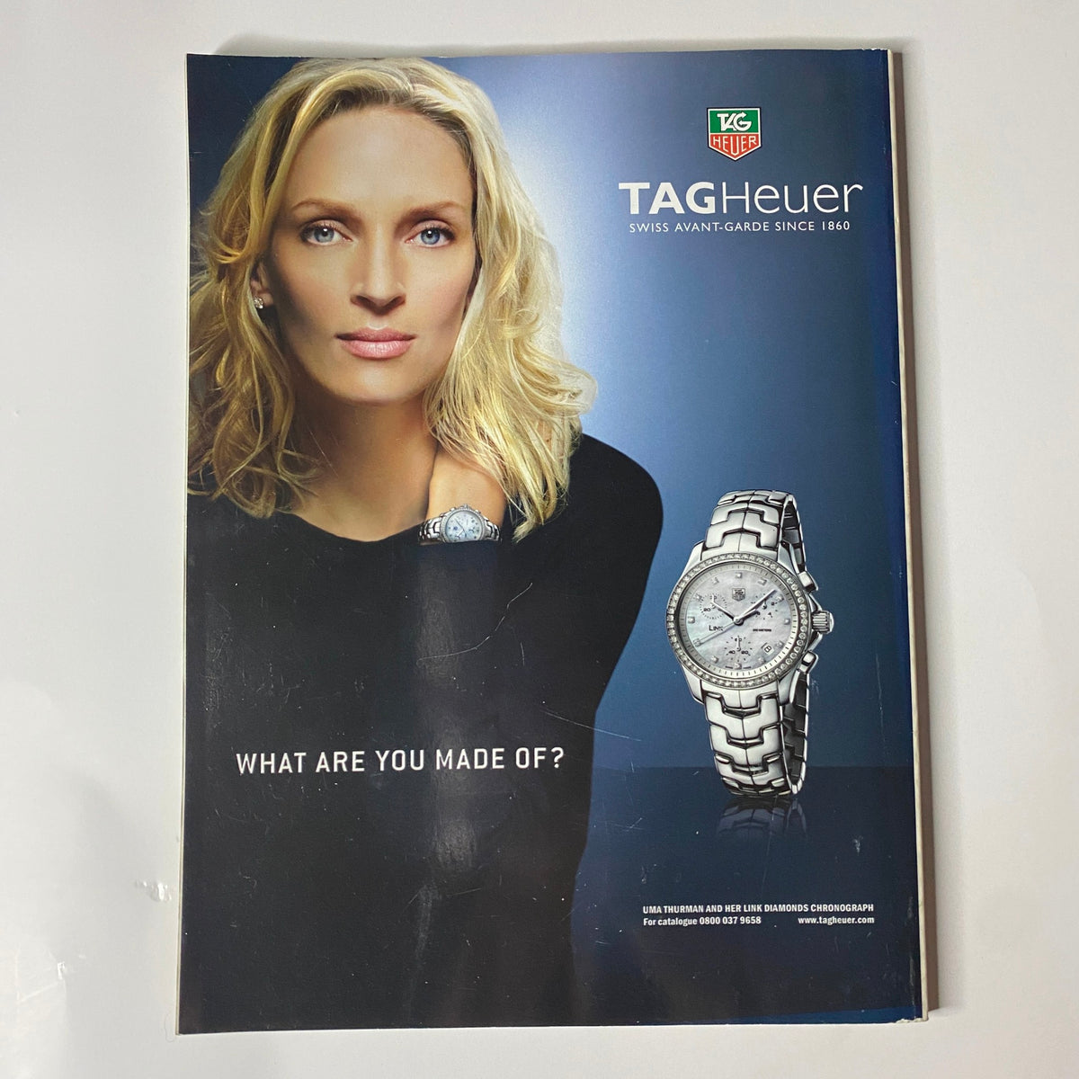 Tag Heuer advertisement featuring a model, showcasing the TAG Heuer Swiss avant-garde watch collection with the tagline 'WHAT ARE YOU MADE OF?' - Harper's Bazaar British Magazine July 2007 Luca Gajdus Cover.