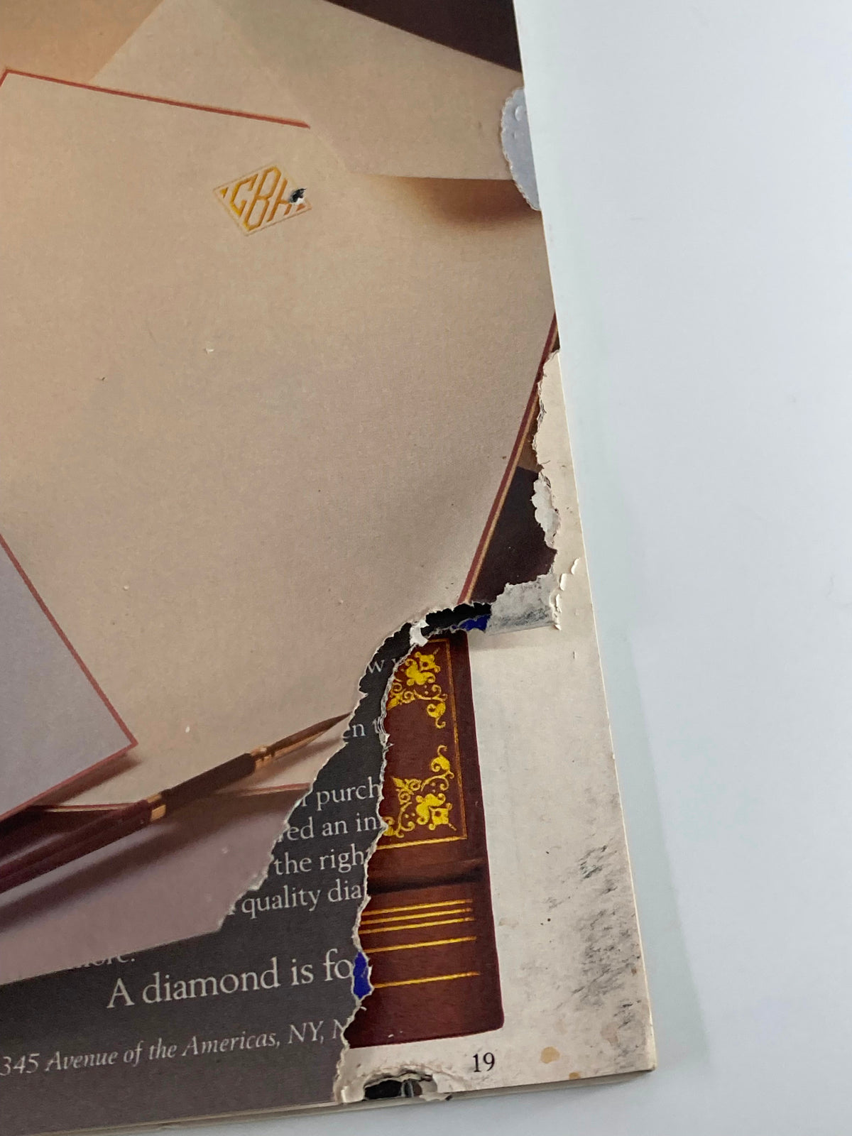 Detail view showing the back cover of March 1984 Vanity Fair Magazine, emphasizing wear and vintage character, part of literary history.