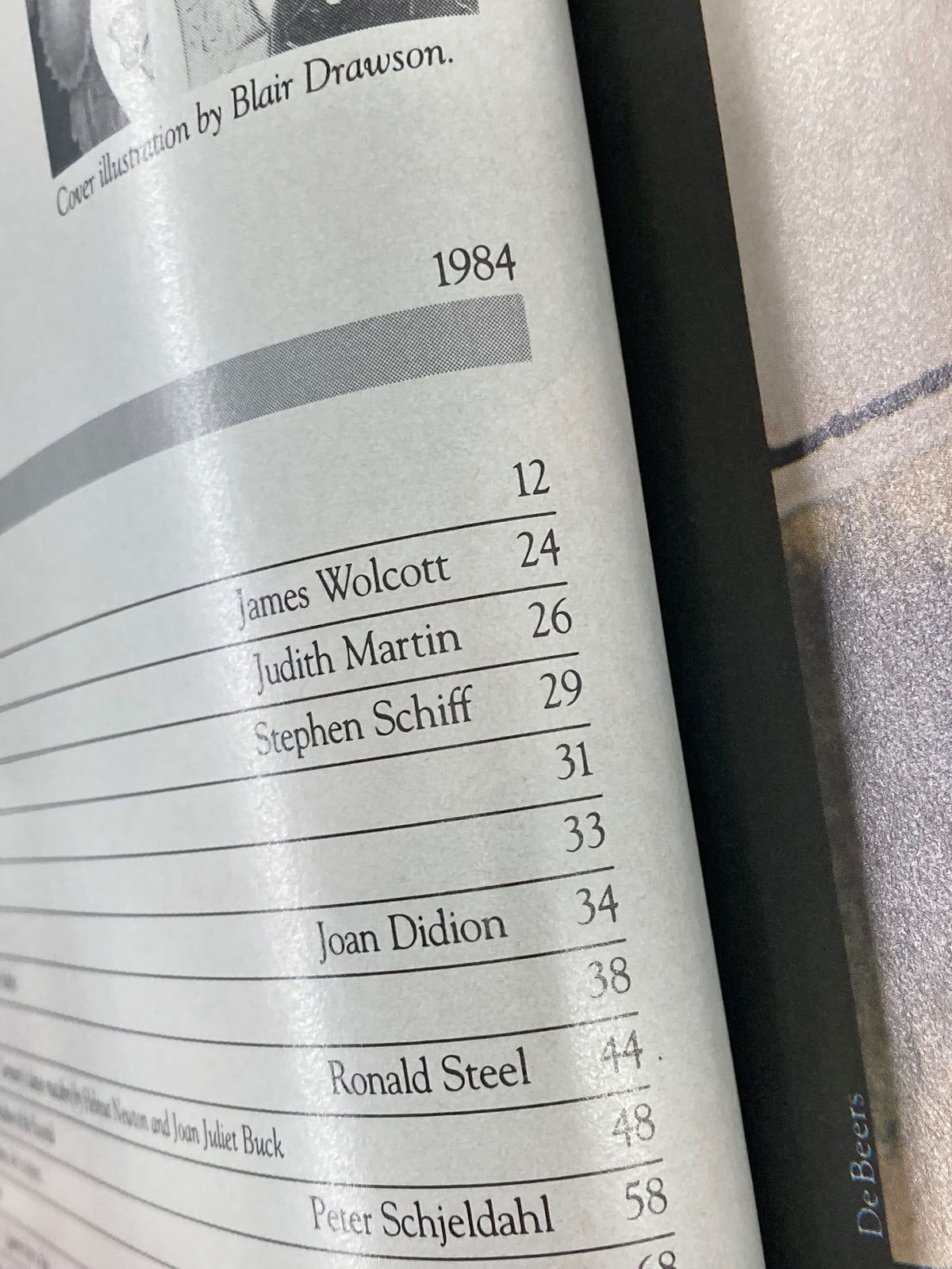 Page from the VTG Vanity Fair Magazine March 1984 illustrating table of contents, featuring notable authors such as Joan Didion and Dominick Dunne, showcasing its cultural relevance.