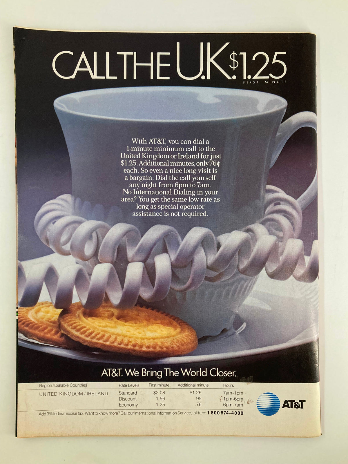 Back cover of VTG Time Magazine March 1984 featuring an advertisement for AT&T phone services to the UK, illustrating vintage advertising design.