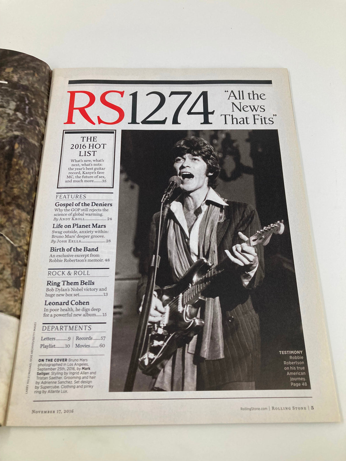 Inside page of Rolling Stone Magazine November 17 2016 Issue 1274, highlighting an article with the title 'All the News That Fits' and a photograph of Bob Dylan performing.