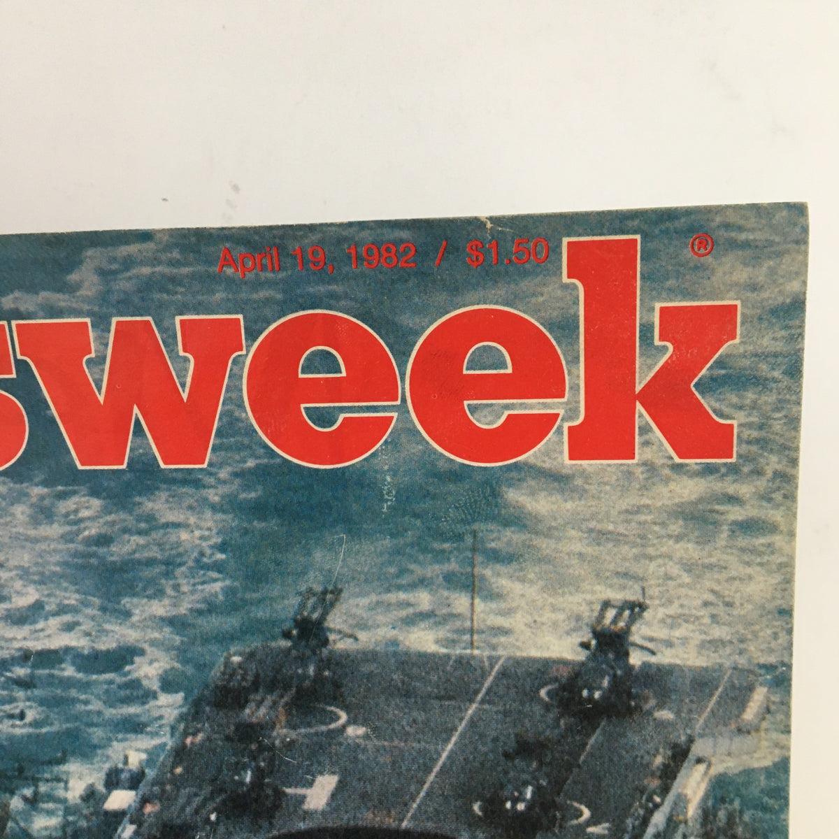 Close-up of the Newsweek Magazine title from April 19, 1982, highlighting its edition date and price, with a military vessel illustration in the background.