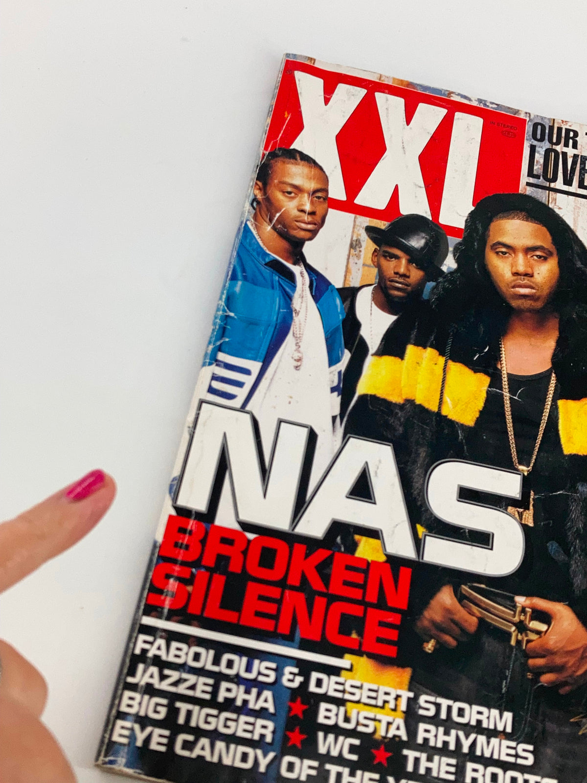 Close-up of the XXL Magazine January 2003 cover featuring NAS titled 'Broken Silence,' highlighting the magazine's vintage design and included hip-hop artists.
