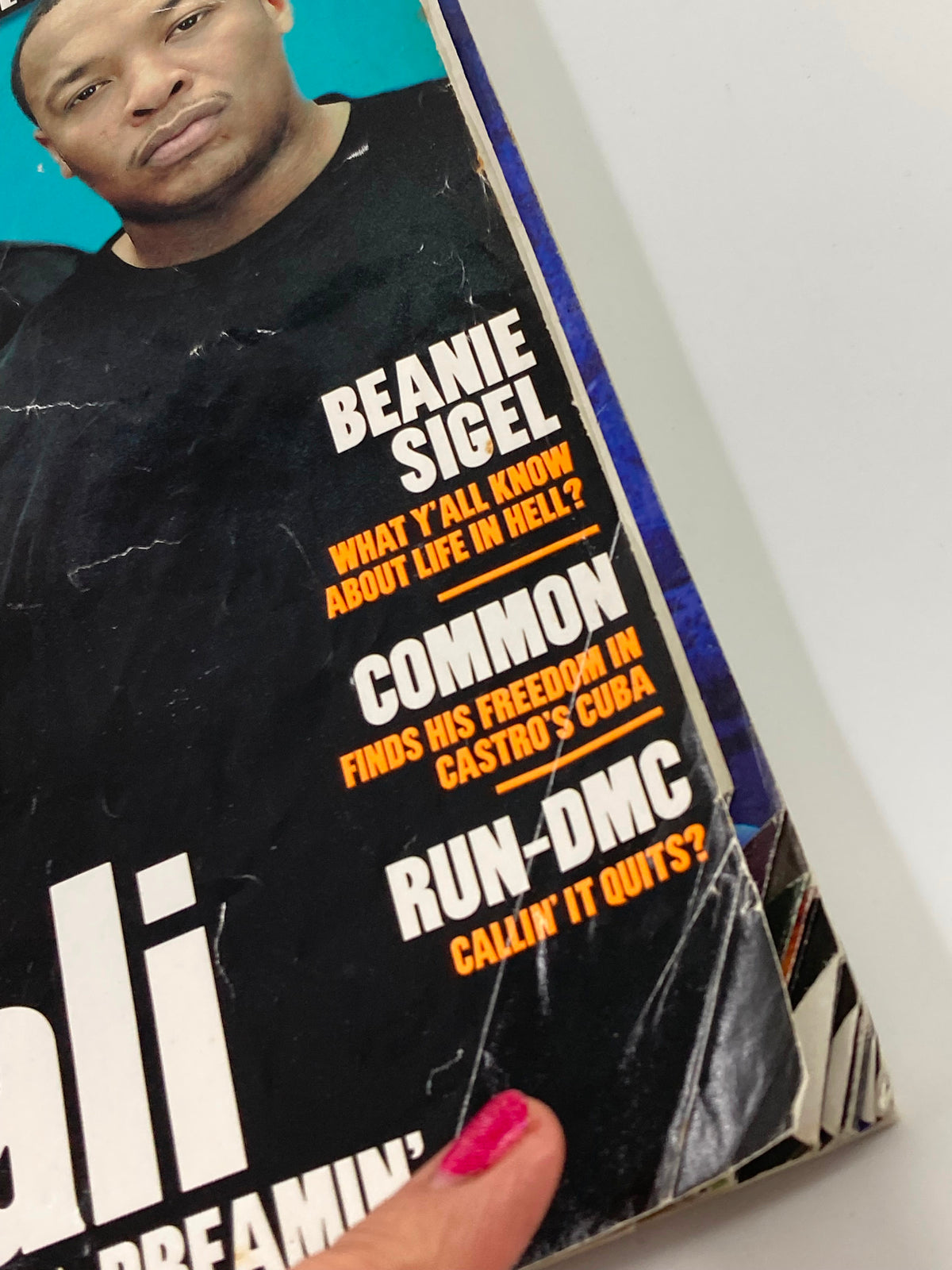 Side view of The Source Magazine April 2000 showing Beanie Sigel and Common articles, emphasizing the magazine's influence on hip-hop.