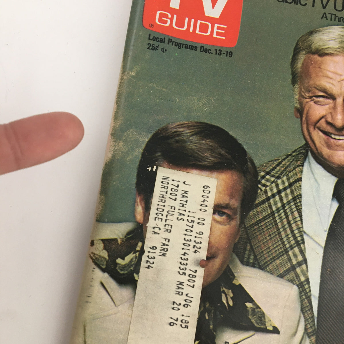 Cover of TV Guide Magazine December 13, 1975 featuring Robert Wagner and Eddie Albert, displaying minor wear and an address label, indicative of vintage magazine condition.