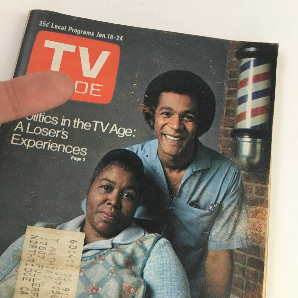 Close-up of the TV Guide Magazine cover dated January 18, 1975, showcasing stars Theresa Meritt and Clifton Davis with a vintage design and programming details.