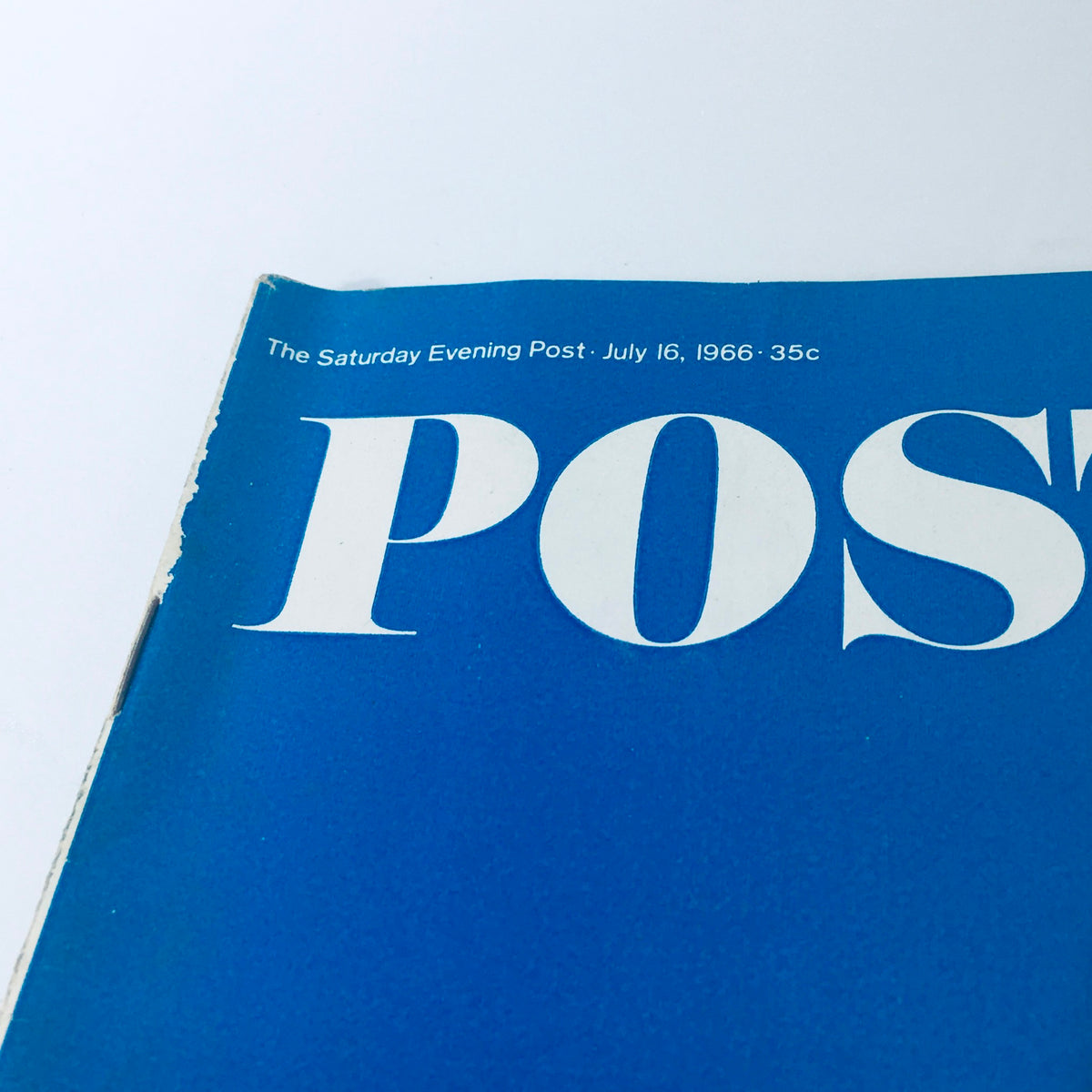 Upper section of the Vintage The Saturday Evening Post magazine from July 16, 1966, displaying the title prominently in bold letters, emphasizing its vintage appeal and historical significance.
