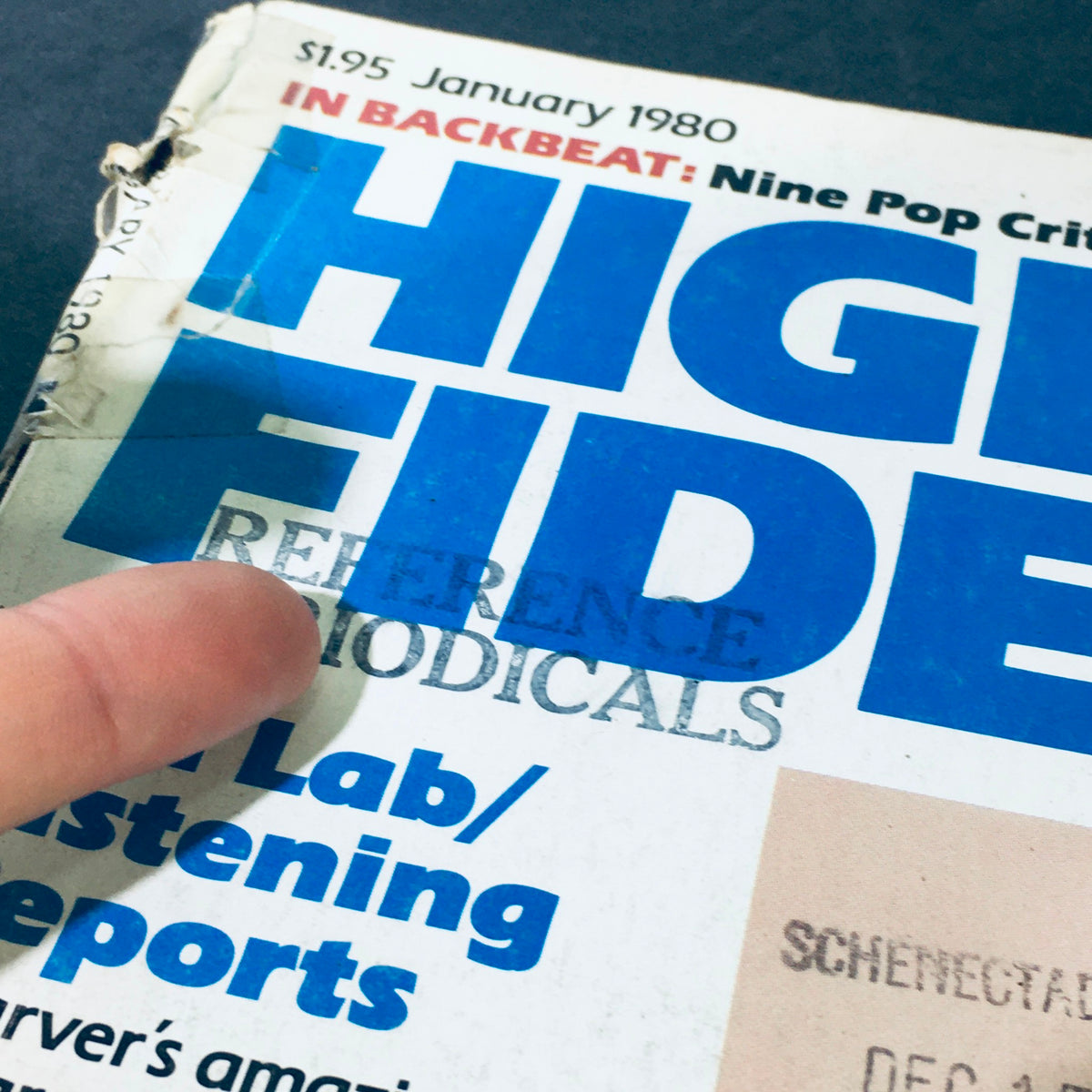 Another close-up view of the spine details of VTG High Fidelity Magazine January 1980, emphasizing its vintage features and wear.