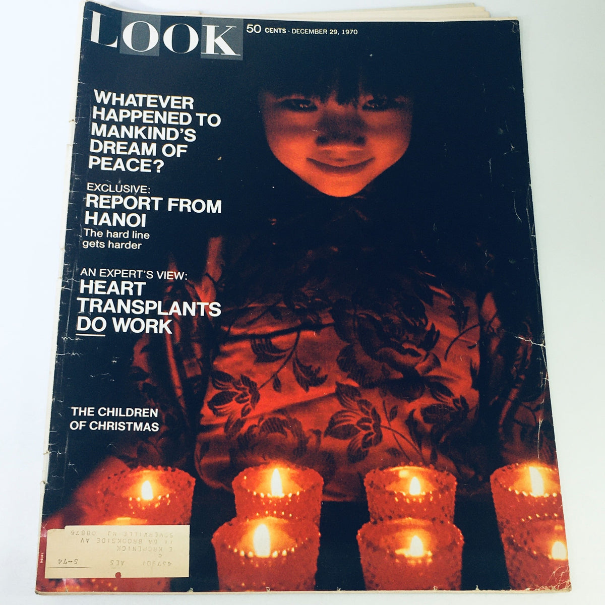 Cover of VTG Look Magazine December 29 1970 featuring a child and candles, highlighting stories like 'The Children of Christmas' and a report from Hanoi.