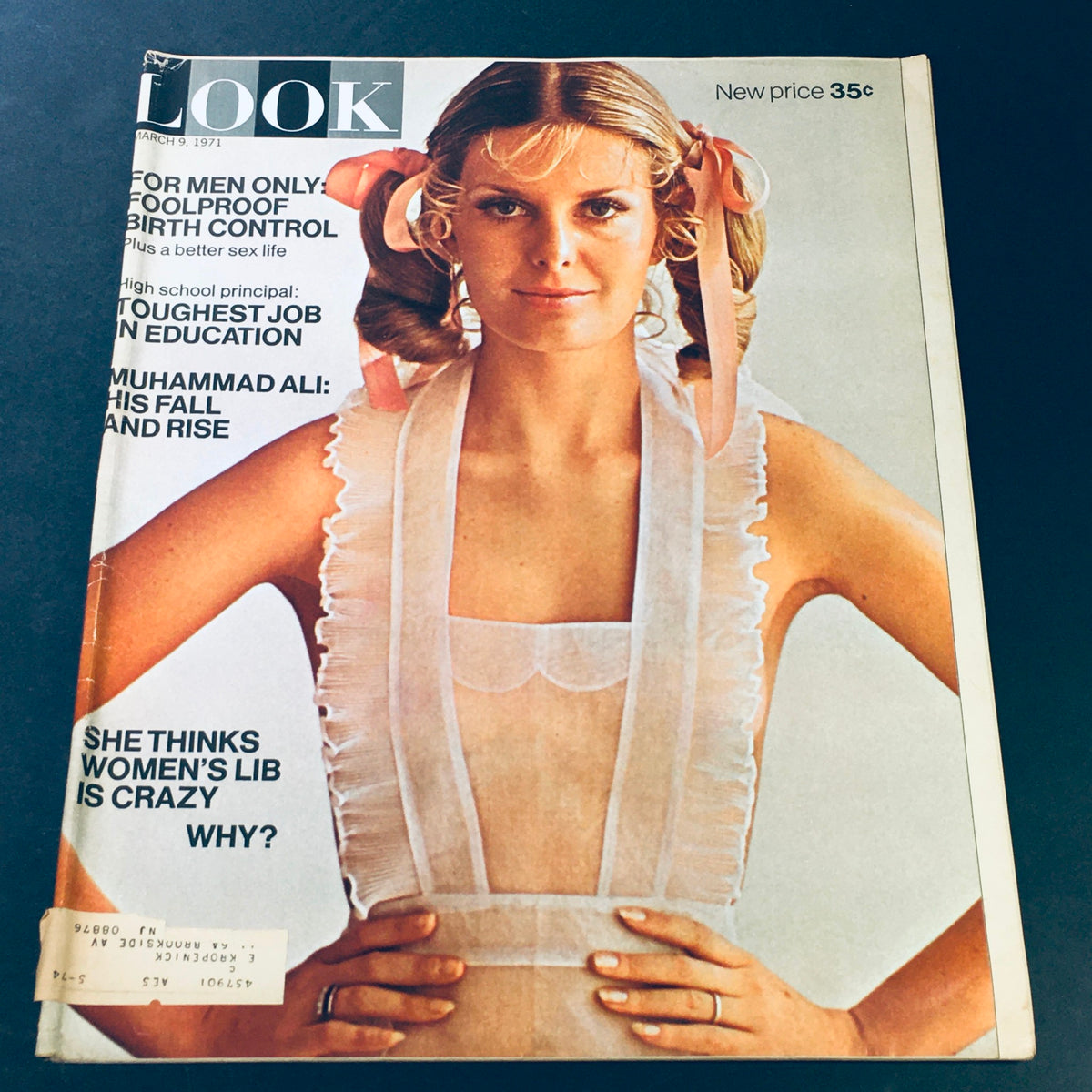 Cover of Look Magazine March 9, 1971 featuring Muhammad Ali and a model, highlighting the theme 'Toughest Job in Education'.