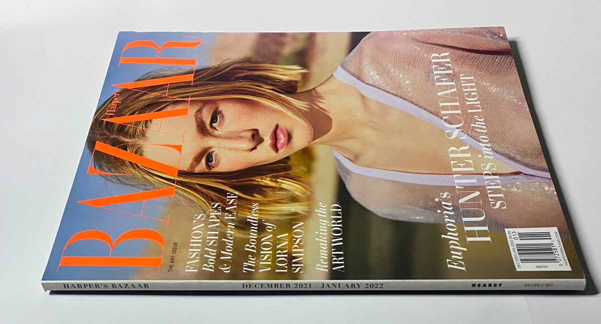 Side view of Harper's Bazaar Magazine December 2021 showcasing Hunter Schafer on the cover, focusing on her artistic journey and style.