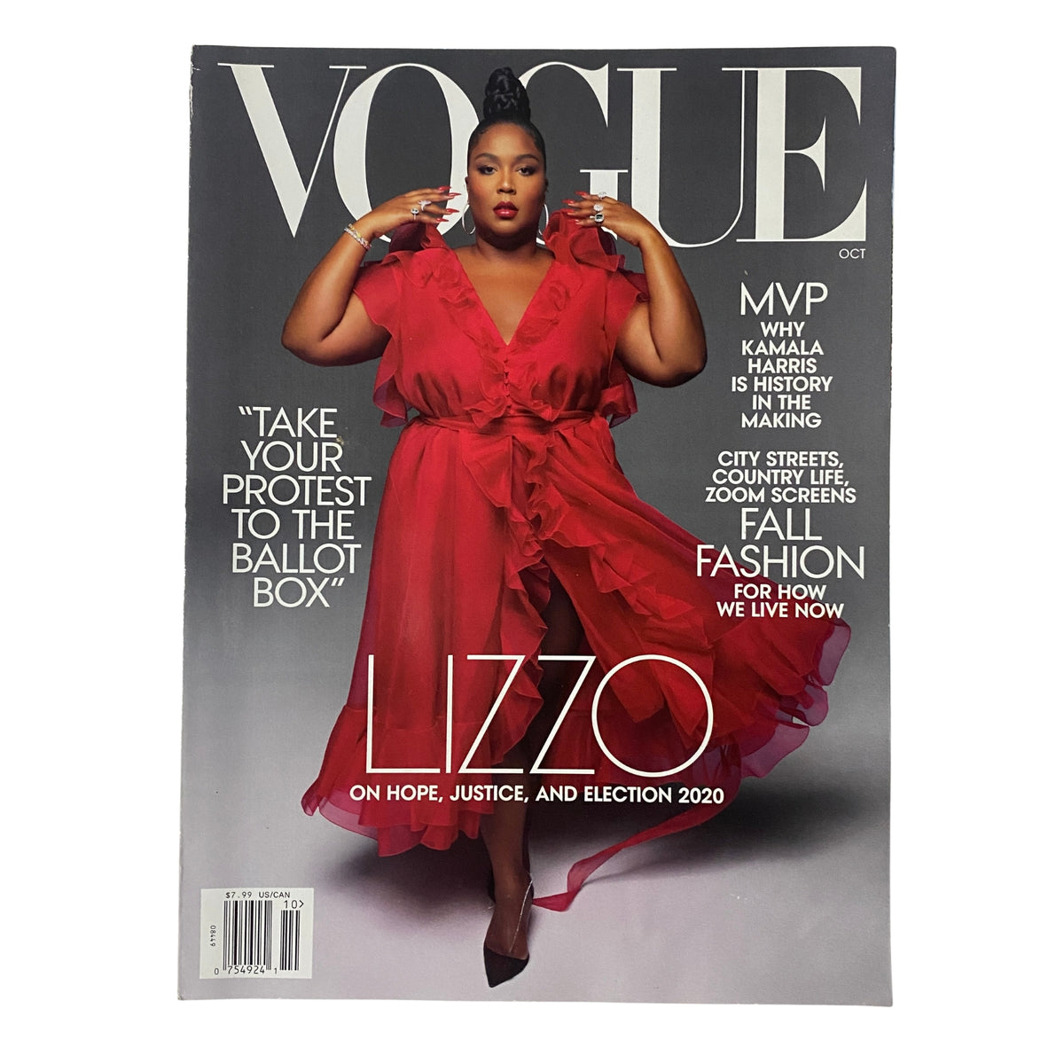 Vogue Magazine October 2020 featuring Lizzo on the cover, styled in a vibrant red dress with an empowering message about voting.