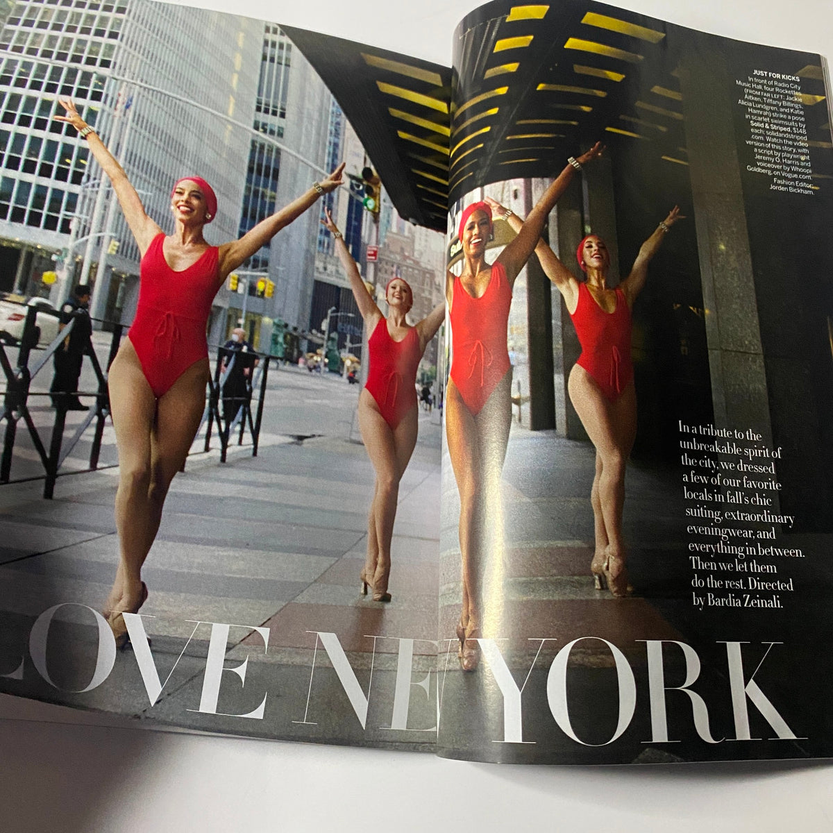 Vogue Magazine October 2020 features a vibrant dance scene titled 'Love New York,' highlighting performers in stylish red swimsuits, celebrating the spirit of the city.