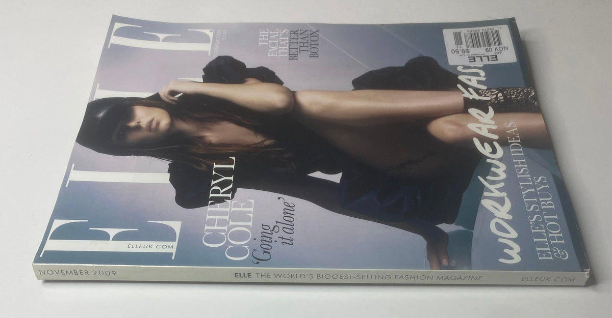 Back view of Elle UK Magazine November 2009 with Cheryl Cole on the cover, emphasizing workwear fashion and beauty insights, available in very good condition.