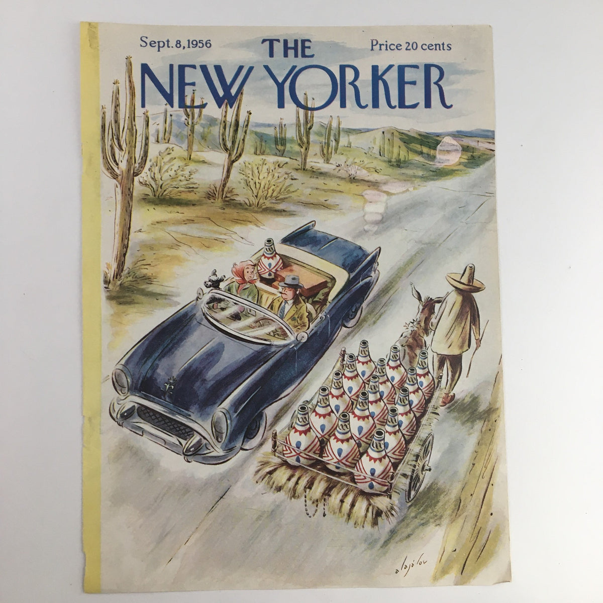 The New Yorker cover from September 8 1956, illustrating a blue classic car on a rural road surrounded by cacti, with a cart carrying decorative bottles in tow, art by Constantin Alajalov.