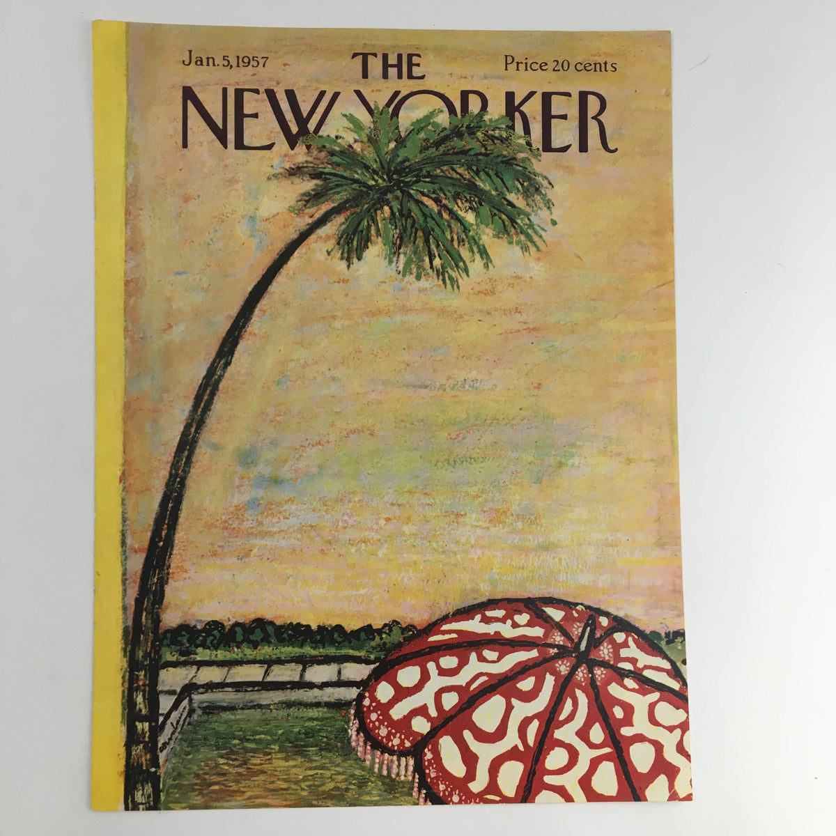 Cover of The New Yorker January 5, 1957, showcasing an artistic depiction of a palm tree and a decorative umbrella against a sunny backdrop, designed by Abe Birnbaum.