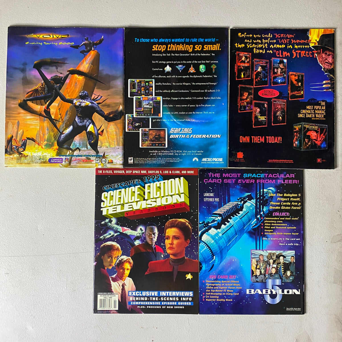 Back covers of vintage science fiction magazines featuring promotional content related to Star Trek, showcasing scenes from the series and gaming, emphasizing the cultural impact of Star Trek collectibles.