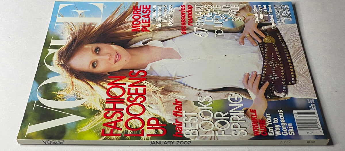 Vogue Magazine January 2002 featuring Julianne Moore on the cover, showcasing the headline 'Fashion Loosens Up' with a stylish layout.