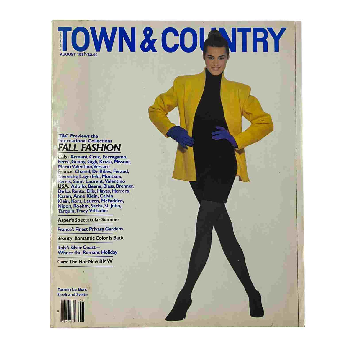 Cover of Town & Country Magazine August 1987, featuring a model in a bright yellow blazer and black outfit, highlighting Fall Fashion. Emphasizes iconic designers and high fashion from the late 1980s.