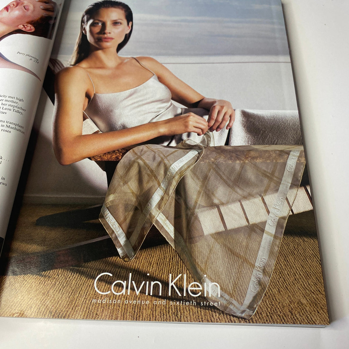 Vogue Magazine August 1998 Carolyn Murphy featuring an advertisement for Calvin Klein, showcasing minimalist fashion aesthetics popular in the late 90s.