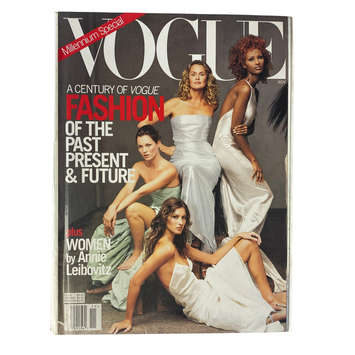 Cover of Vogue Magazine November 1999 featuring supermodels Kate Moss, Gisele Bündchen, and others in elegant dresses, showcasing fashion from the past, present, and future.