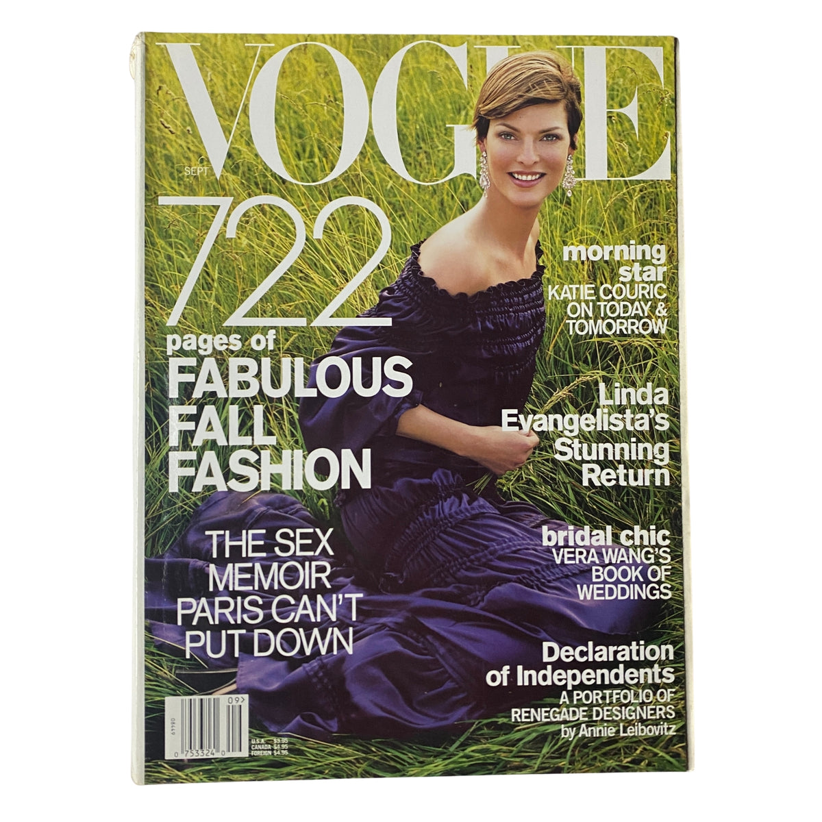 Vogue Magazine September 2001 Linda Evangelista Cover - No Label - features the model in an elegant dress against a lush grassy backdrop, showcasing fall fashion trends.