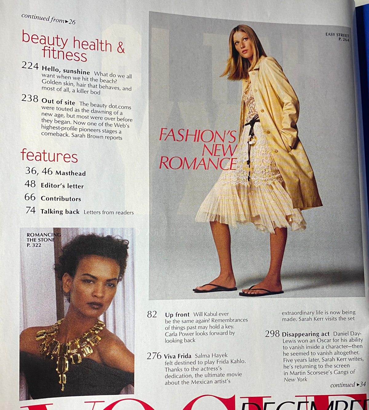 Vogue Magazine December 2001 Gisele Bündchen Cover showcasing fashion and style highlights, includes 'Fashion's New Romance' article.
