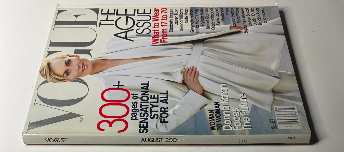 Vogue Magazine August 2001 with Amber Valletta on the cover, emphasizing 'The Age Issue' and the concept of fashion for all ages. The magazine is in very good condition.