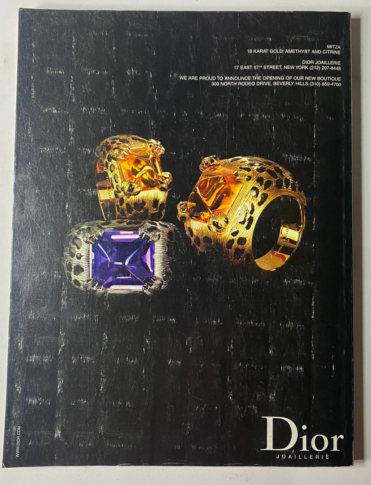 Vogue Magazine February 2002 Sarah Jessica Parker Cover No Label presents the back cover featuring luxurious Dior joaillerie, showcasing 18-karat gold accessories with an elegant design.
