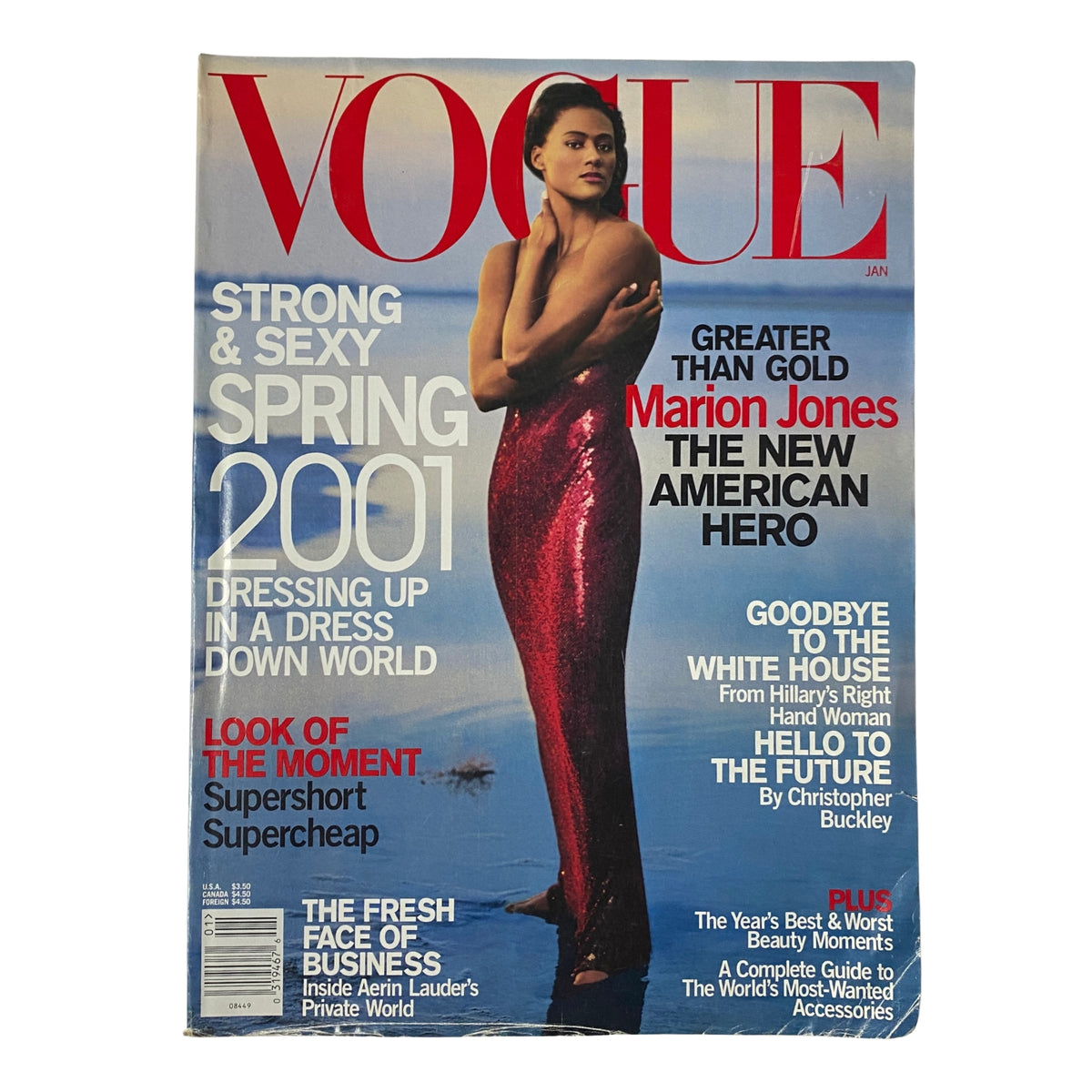 Vogue Magazine January 2001 cover featuring Olympian Marion Jones wearing a sparkling red dress, highlighting her as the new American hero.
