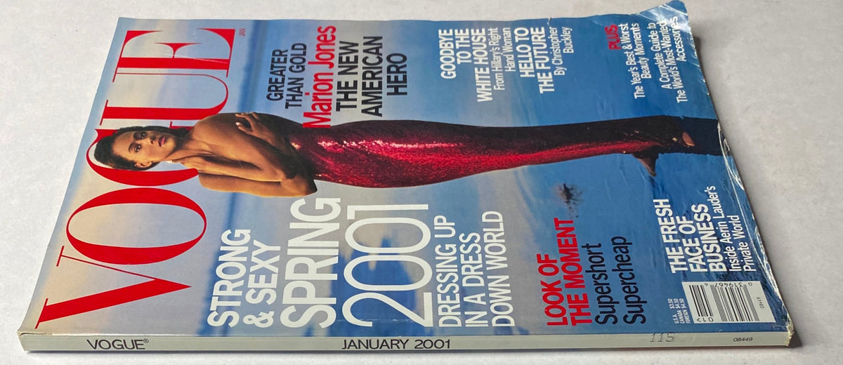 Back cover of Vogue Magazine January 2001, showcasing Olympian Marion Jones in a stylish red dress, underscoring the theme 'Strong and Sexy Spring 2001'.