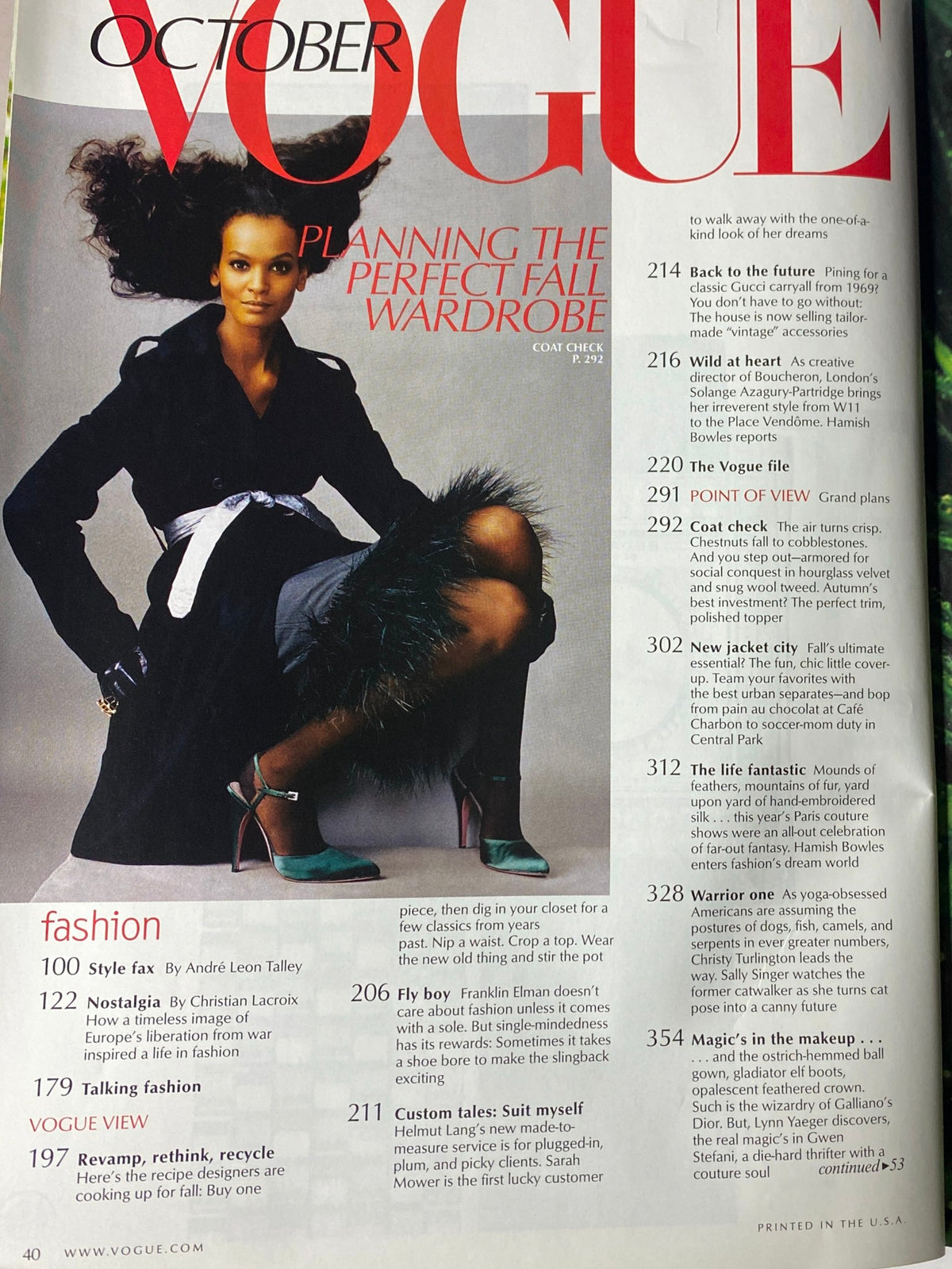 October 2002 Vogue Magazine featuring an editorial spread on planning the perfect fall wardrobe, with a model dressed in stylish attire.