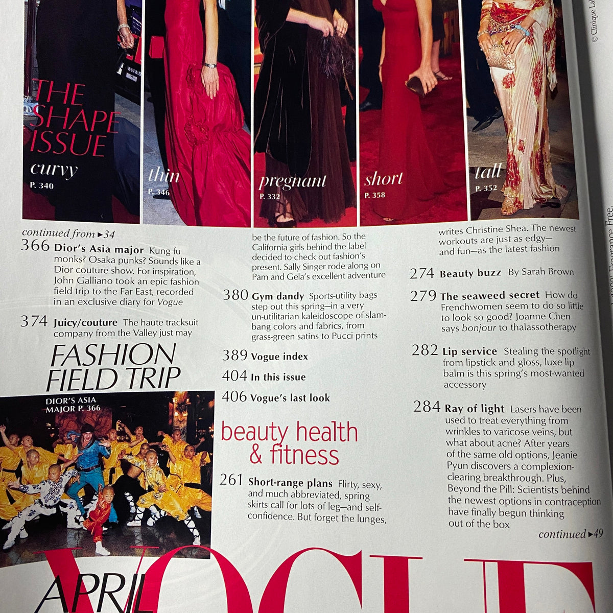 Vogue Magazine April 2003 Brooke Shields Cover No Label VG highlights fashion trends with diverse models showcasing unique styles, including evening gowns and casual wear.