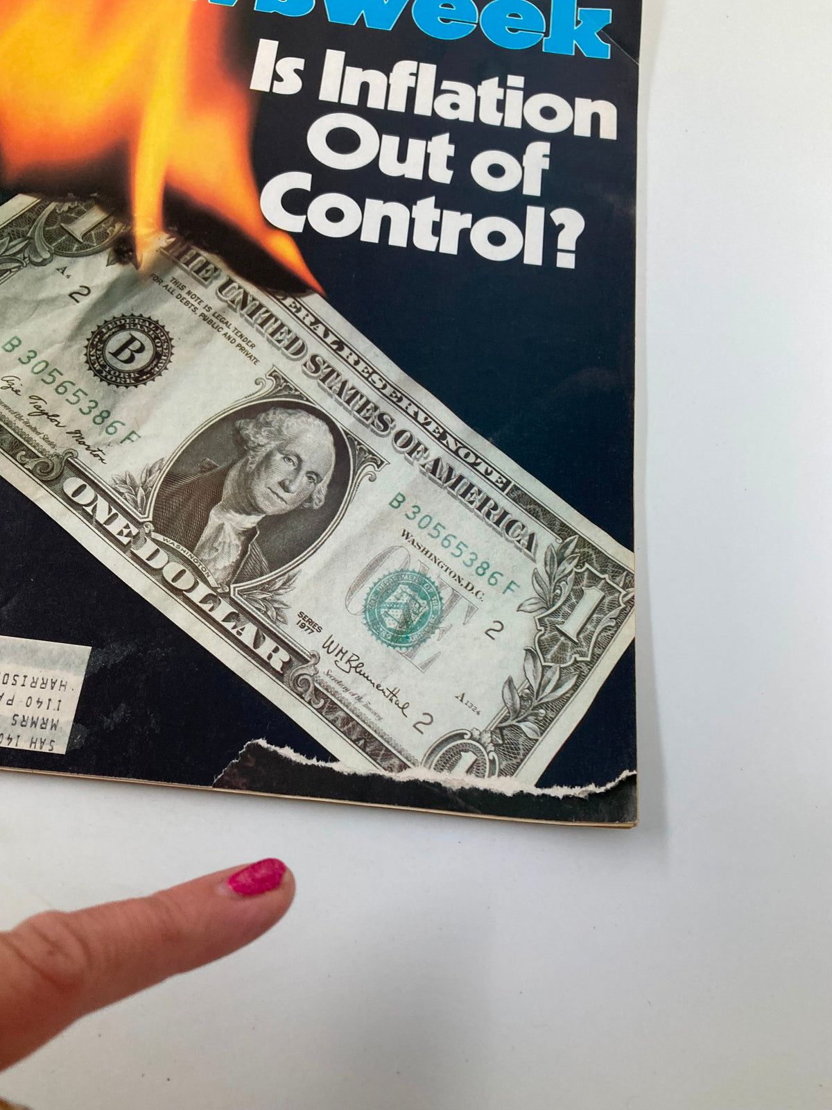Close-up view of the cover of VTG Newsweek Magazine March 3 1980, highlighting the burning dollar bill and text 'Is Inflation Out of Control?' with damage details.