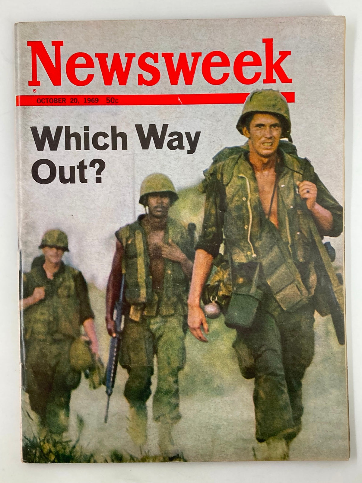 Cover of the VTG Newsweek Magazine from October 20, 1969, titled 'Which Way Out?'. The image features three soldiers walking amidst a Vietnam War backdrop.