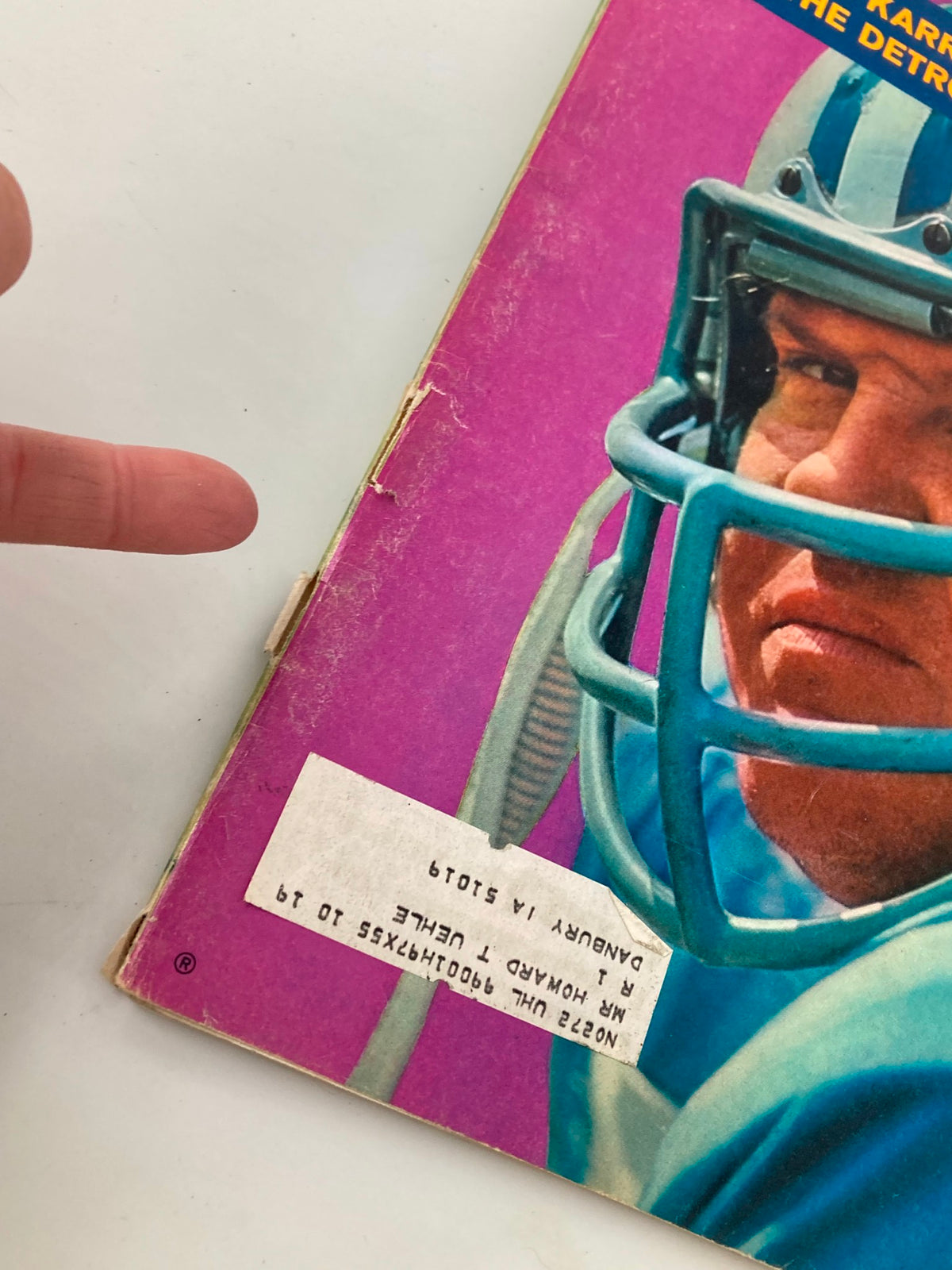 Close-up of the cover of the Vintage Sports Illustrated magazine from October 12, 1970, featuring Alex Karras of the Detroit Lions, displaying minor wear and a label on the front.