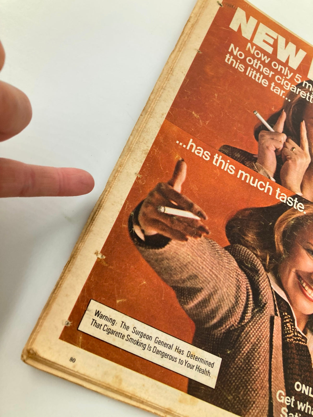 Detail of the VTG The New York Times Magazine from February 18, 1979, showing a cigarette advertisement with a warning label about smoking dangers. This vintage magazine edition celebrates Albert Einstein.