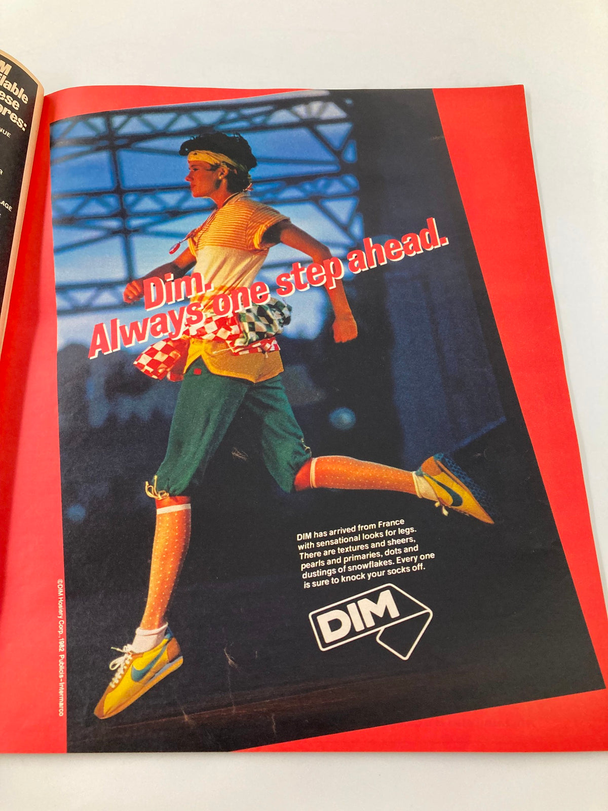 Promotional image in VTG The New York Times Magazine September 19 1982 for DIM, featuring a model dressed in colorful activewear.